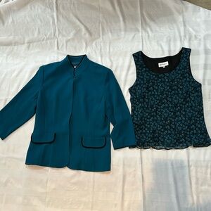 Silky top with matching jacket. three-quarter length sleeves. Black piping.